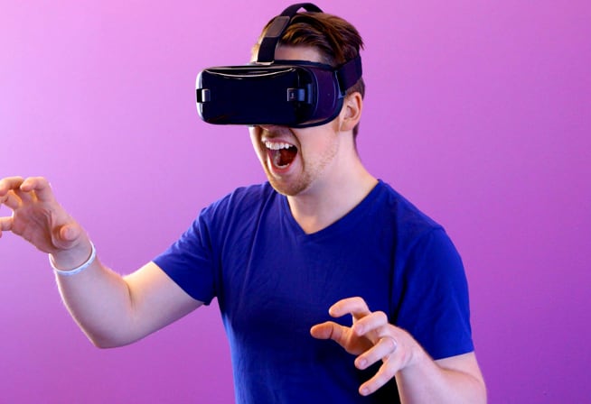 A person using an interactive VR headset